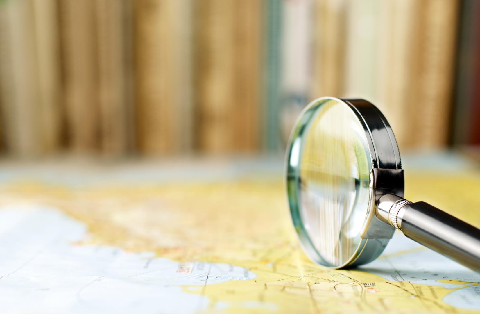 Magnifying glass on a map